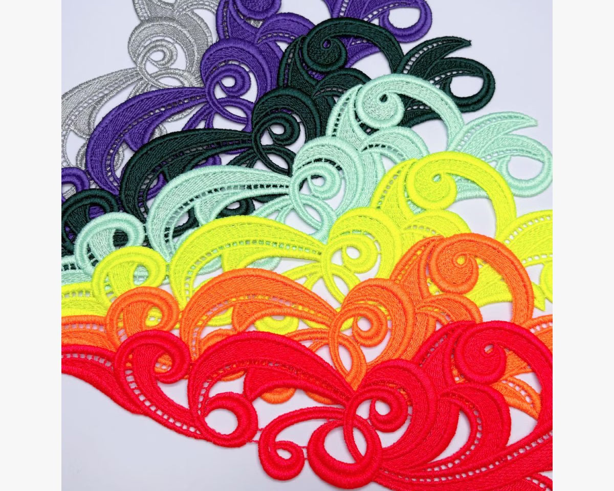 A selection of professional dance trimmings, including colour-matched motifs, stretch fringe, and crinoline from the Chrisanne Clover range at Blackpool Dance Store.