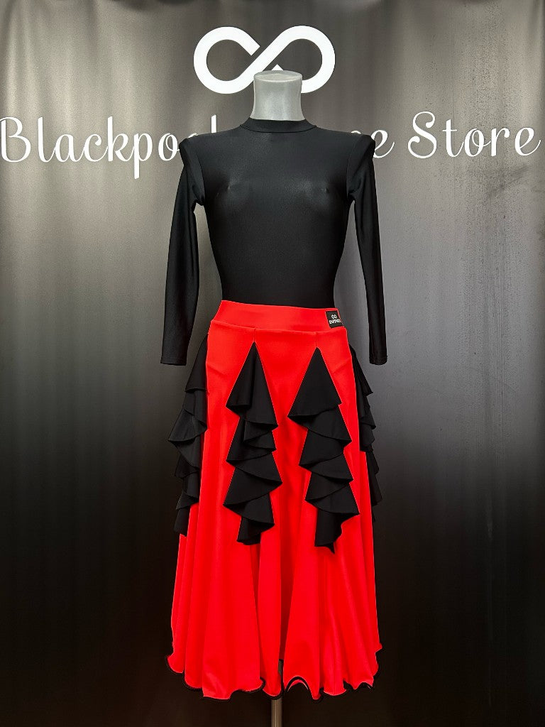 Flavia Dance Skirt in red Chrisanne lycra with black waterfall flounces — front view