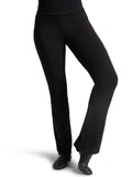 Front view of a dancer wearing black Capezio® Cotton V-Front Jazz Pants and jazz shoes, showing the flattering bootcut leg fit.
