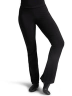 Front view of a dancer wearing black Capezio® Cotton V-Front Jazz Pants and jazz shoes, showing the flattering bootcut leg fit.