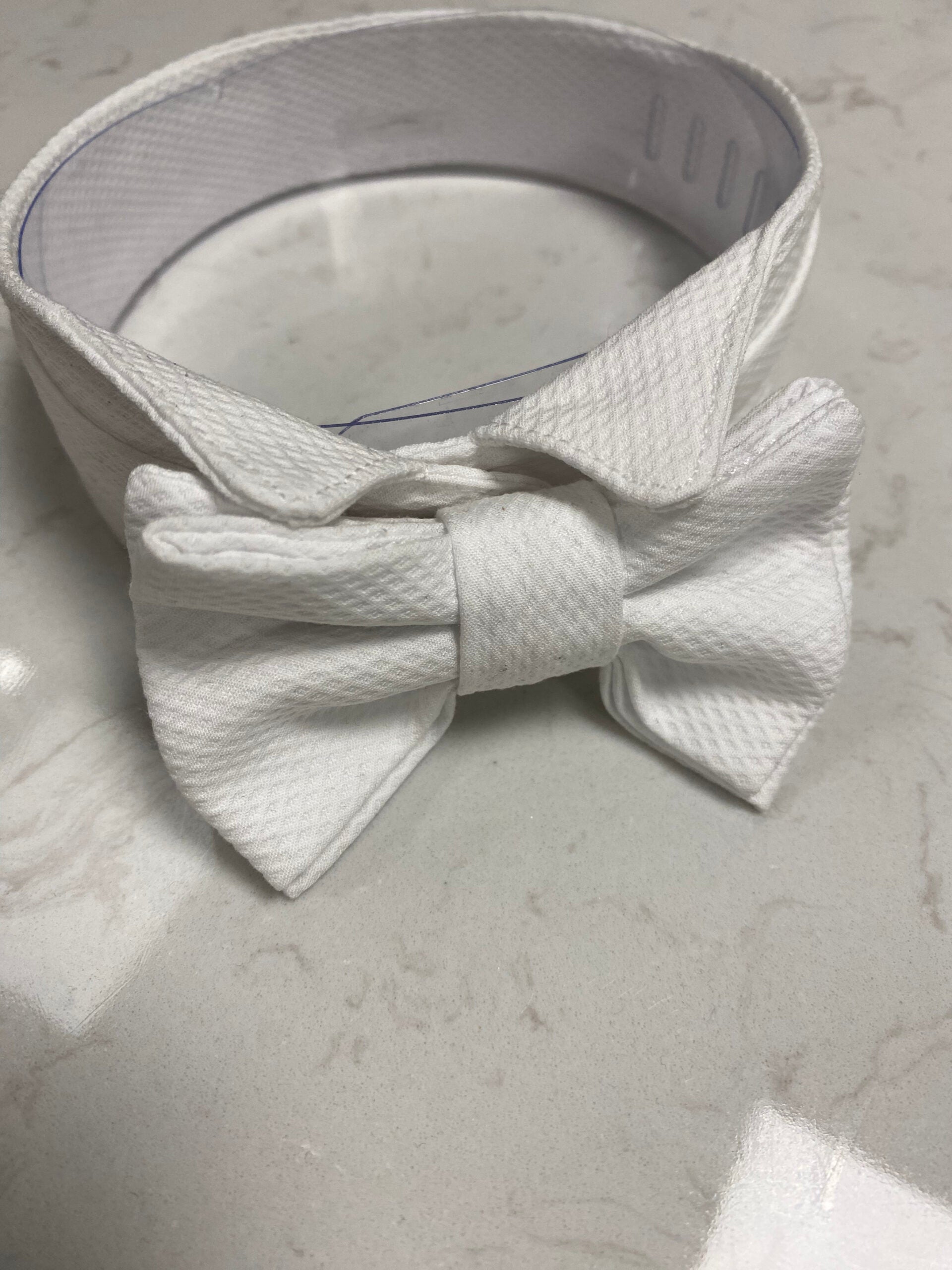 Crisp white 3.5cm deep Marcella cotton detachable dress collar showing the traditional textured weave and clean tailored finish.
