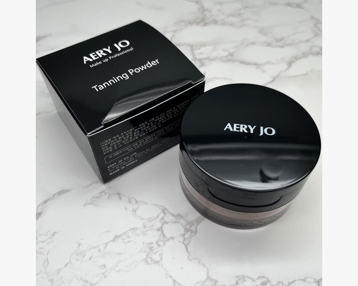 Aery Jo Tanning Powder with luxury black box packaging, professional three-dimensional pearl bronzing powder for competitive ballroom and Latin dancers.