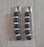 Crystal beaded competition number pins (pair) — black gloss beads with AB crystal rondelles