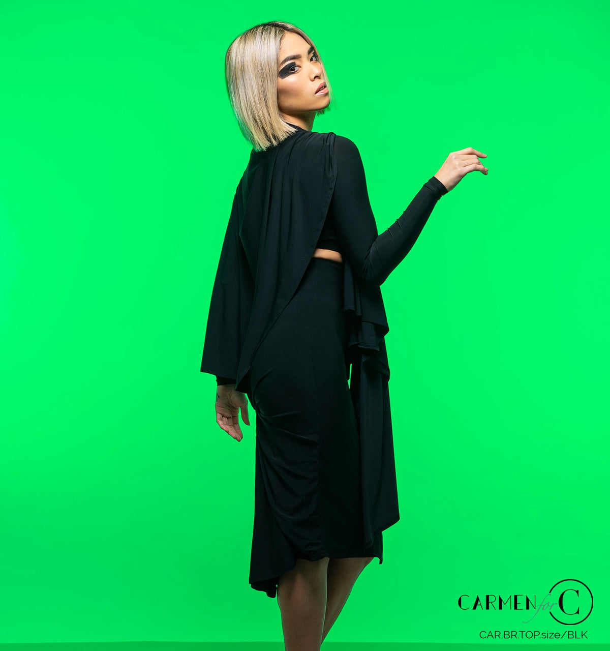 Brigitte top styled with a draped skirt, side view