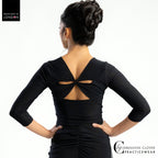 Back view of the Chrisanne Clover Gaia top showing the twisted cut-out back
