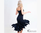 Chrisanne Clover Lynx dance leotard styled with a flowing black asymmetric Latin practice skirt, showing a complete professional training outfit.
