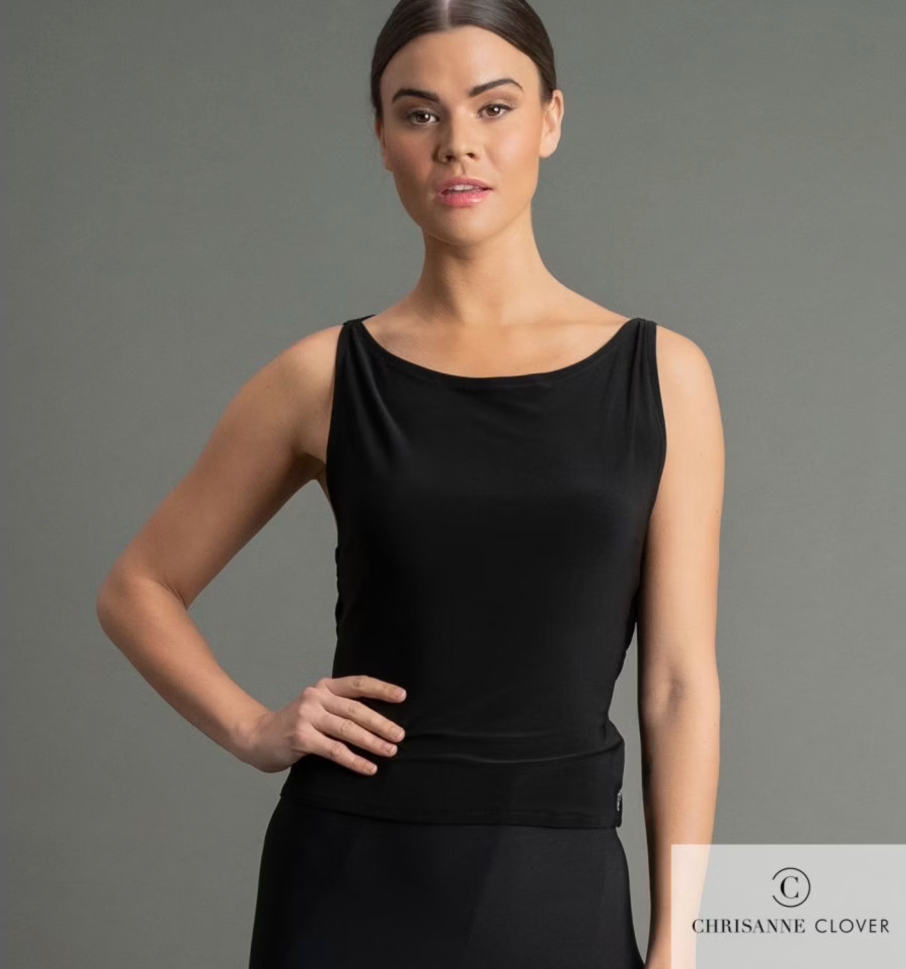 Chrisanne Clover Marcella dance top featuring a sleek fitted sleeveless front silhouette, luxury ladies practice wear with signature crystallized branded logo detail.