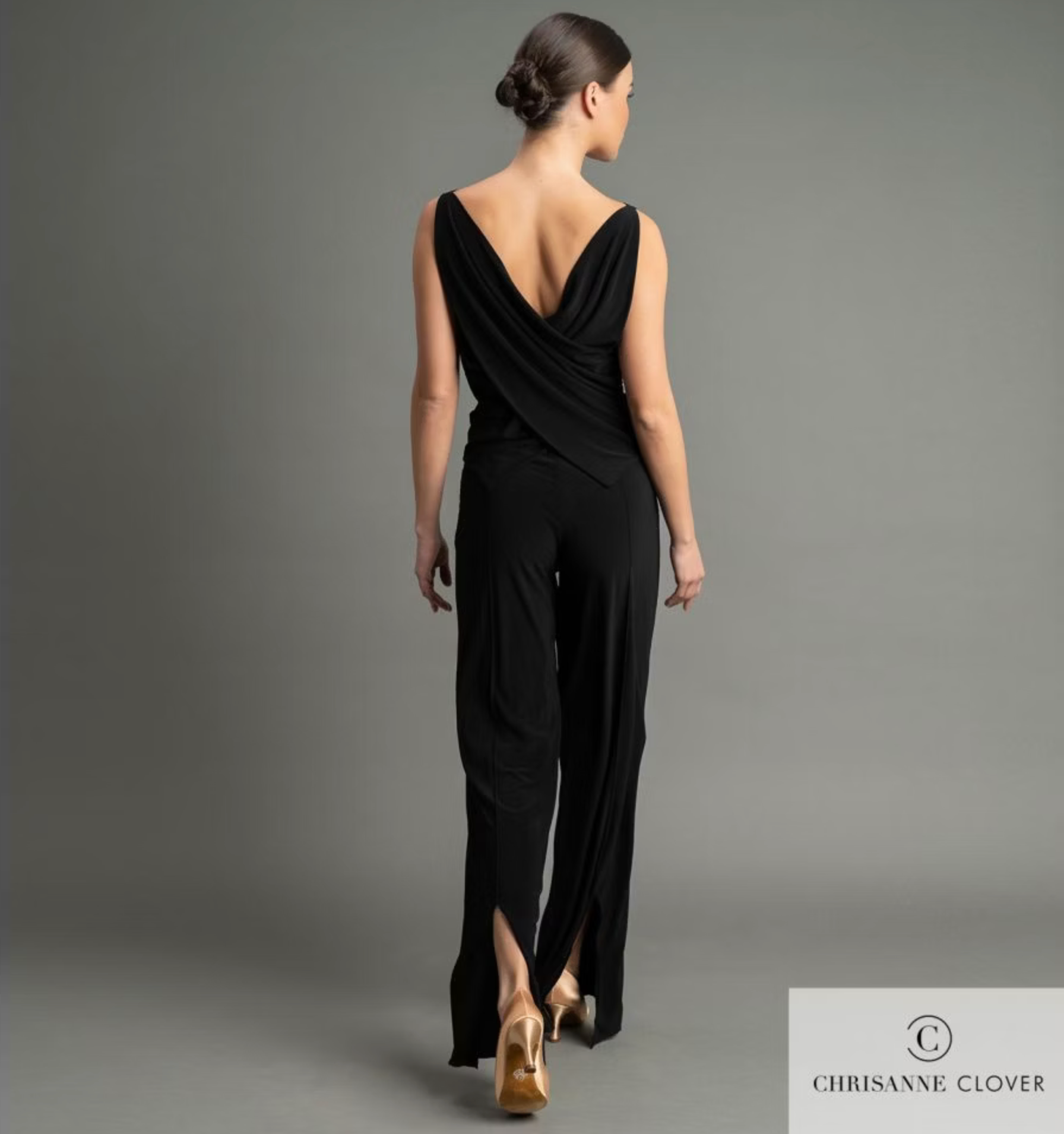 Rear view of the Chrisanne Clover Marcella top in black stretch crepe, showing the deep draped crossover back tailoring for competitive dancers.