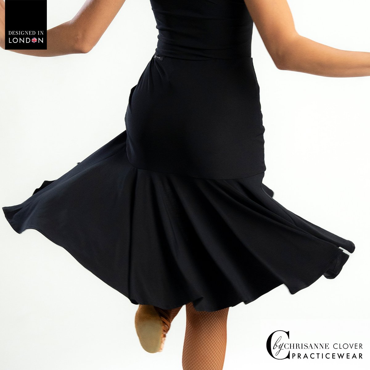 Back view of the Chrisanne Clover Theia Latin skirt swirling in a turn
