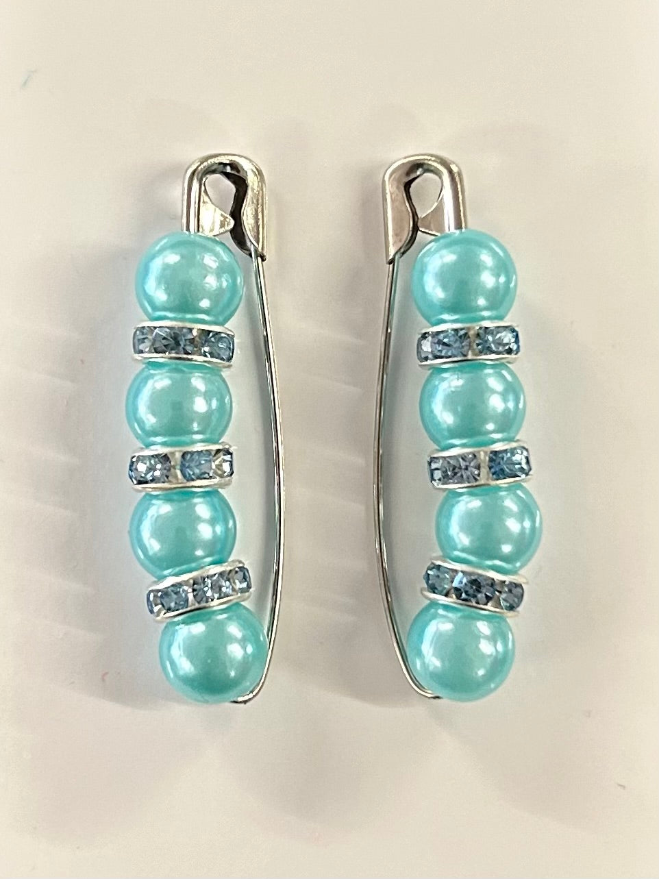 Crystal beaded competition number pins (pair) — light aqua pearls with light blue crystal rondelles