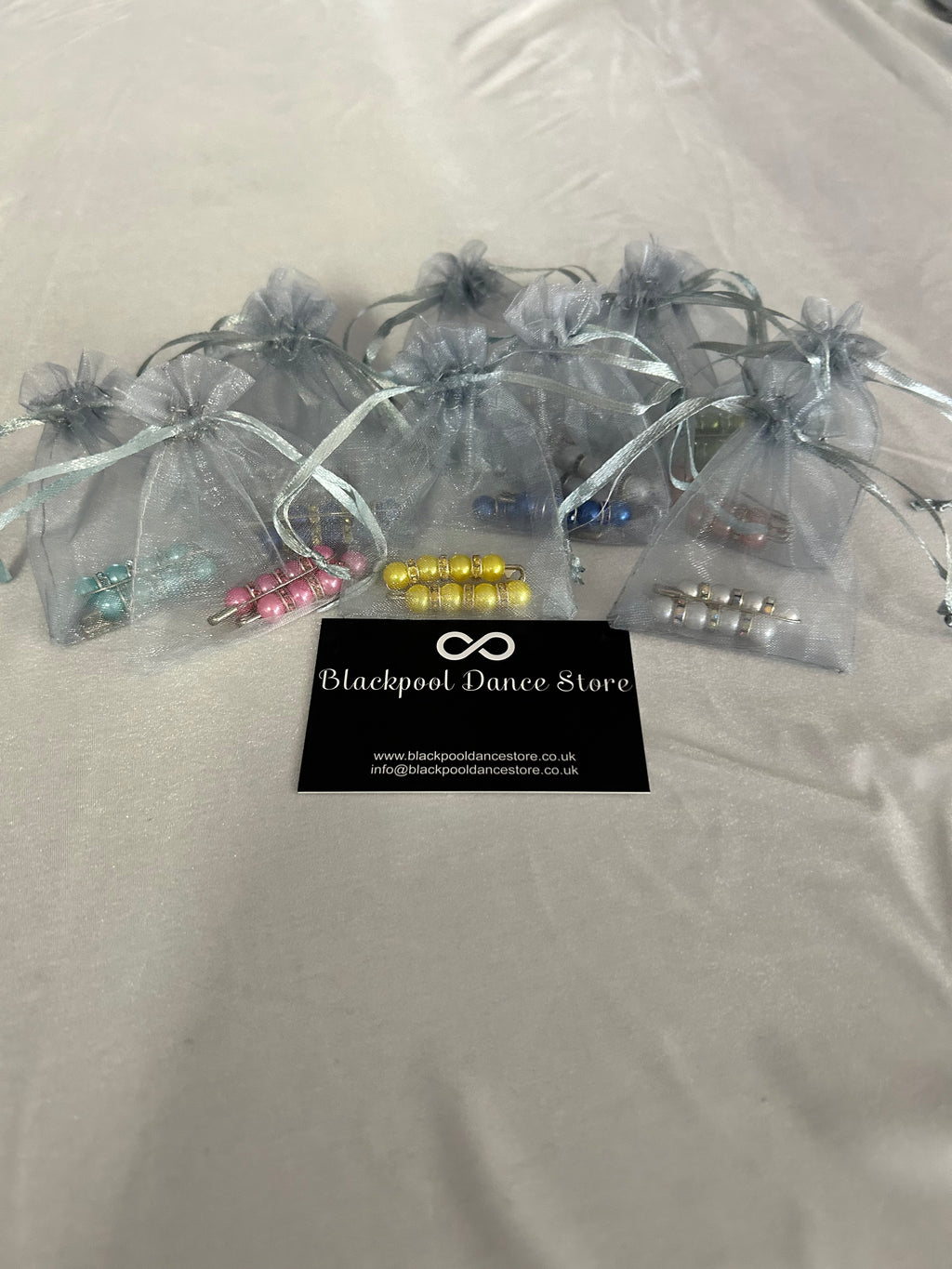 Crystal beaded Ballroom and Latin competition number pins in organza gift bags, selection of colours — Blackpool Dance Store