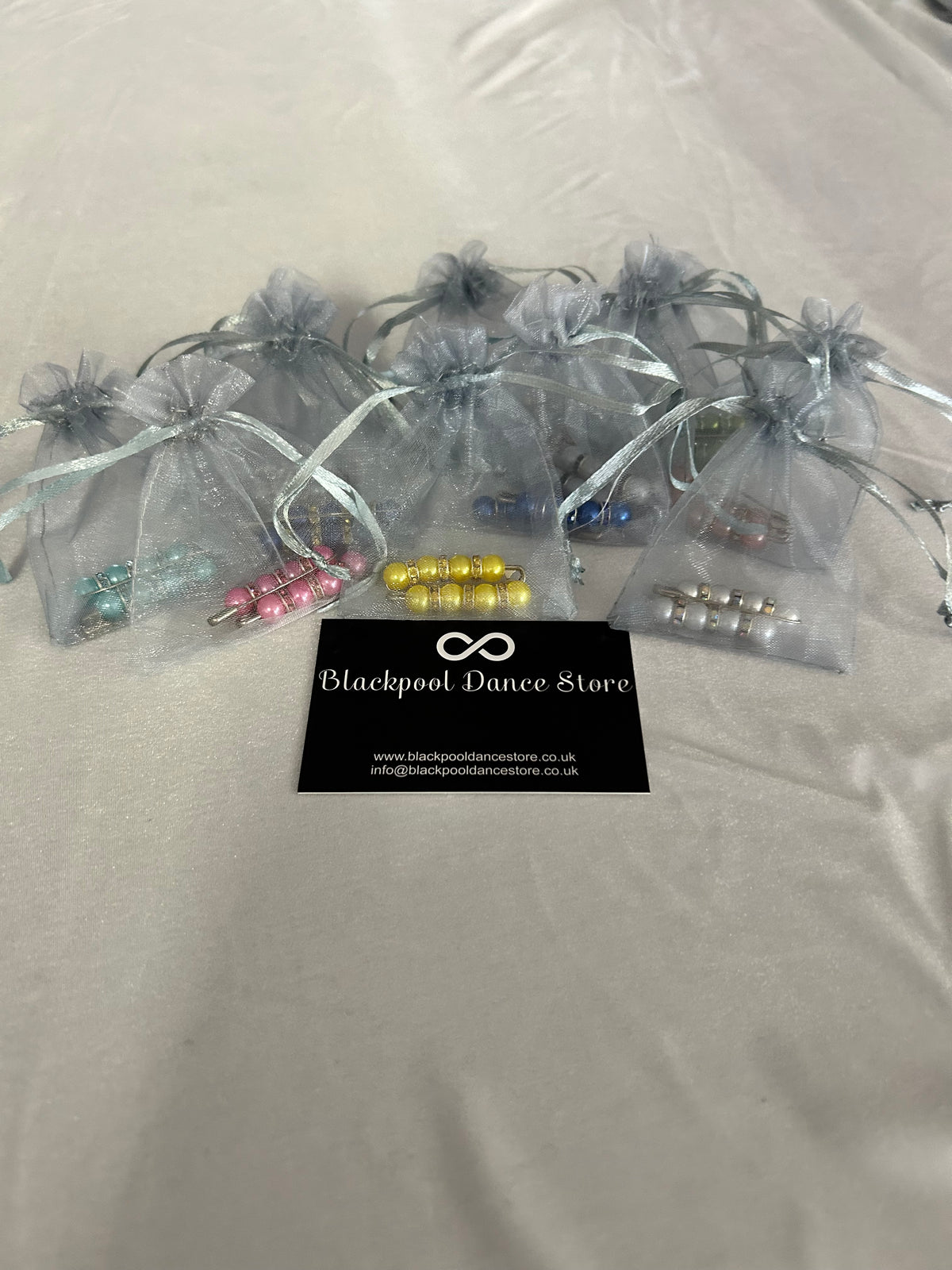 Crystal beaded Ballroom and Latin competition number pins in organza gift bags, selection of colours — Blackpool Dance Store