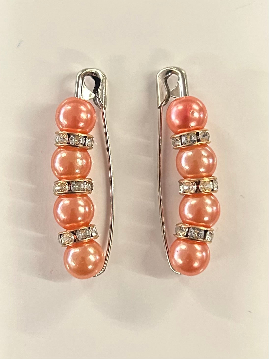 Crystal beaded competition number pins (pair) — peach pearls with clear crystal rondelles