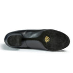 Under sole view of the IDS Boys Rumba Latin dance shoe showcasing the flexible black suede split-sole architecture designed for advanced foot articulation.