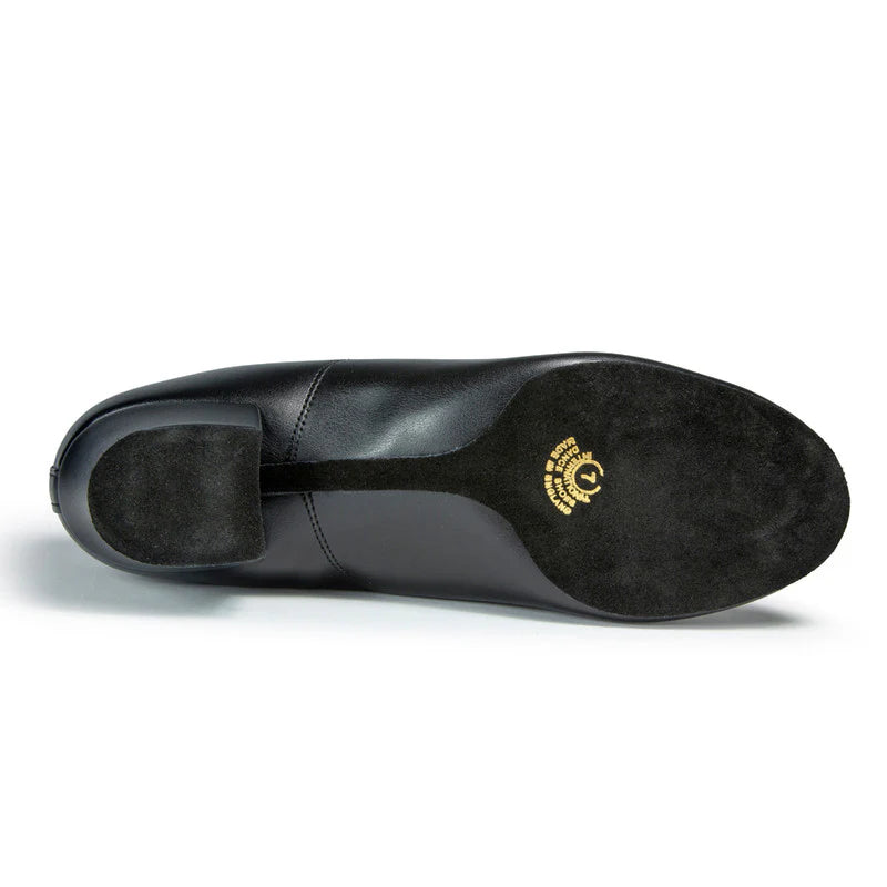 Under sole view of the IDS Boys Rumba Latin dance shoe showcasing the flexible black suede split-sole architecture designed for advanced foot articulation.