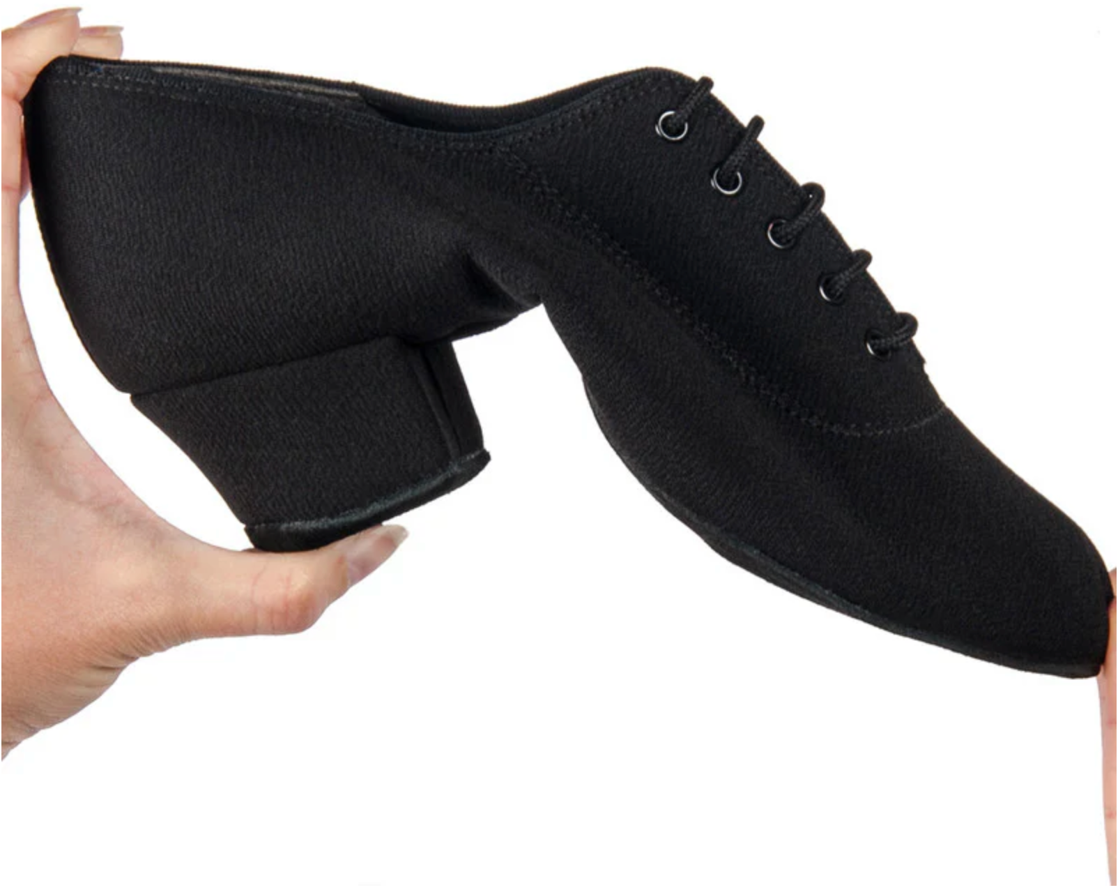Close up view showcasing the extreme flexibility of the IDS Heather split-sole black Lycra dance shoe as it is flexed completely in half by hand
